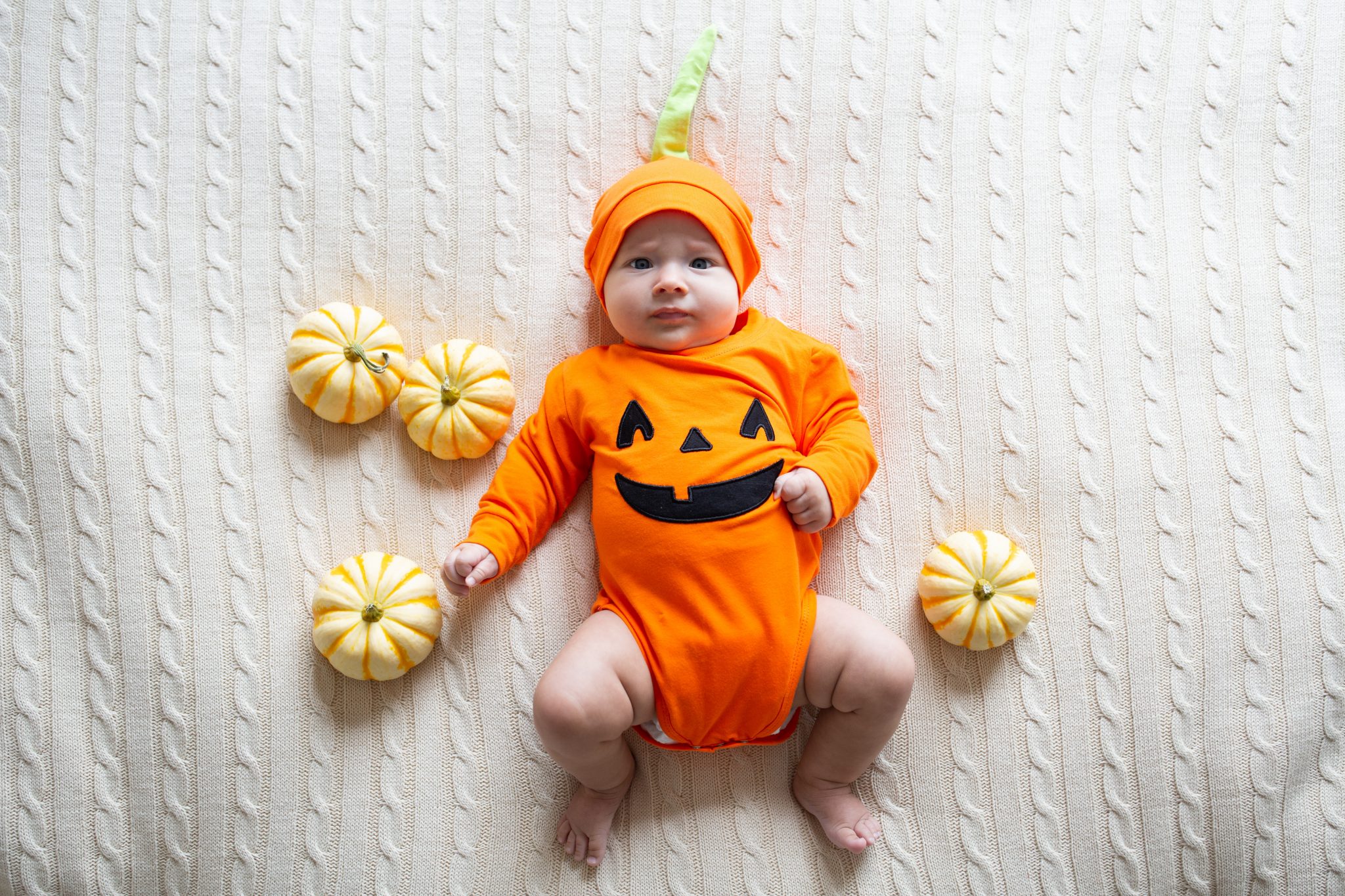 baby dressed as pumpkin for Halloween